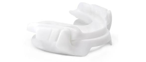 White Panthera X3 custom oral appliance with dorsal fin design, shown from the side